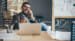 man on phone at desk