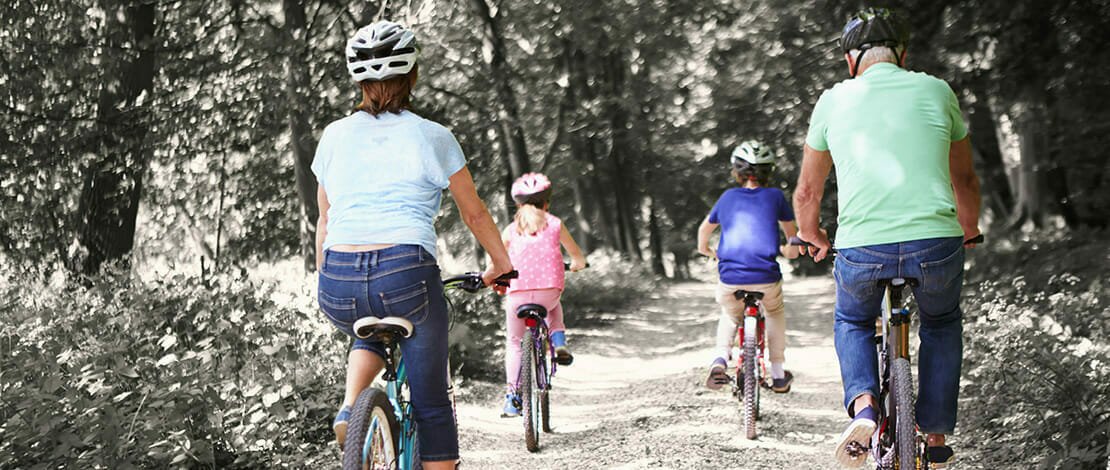 family riding bicycles