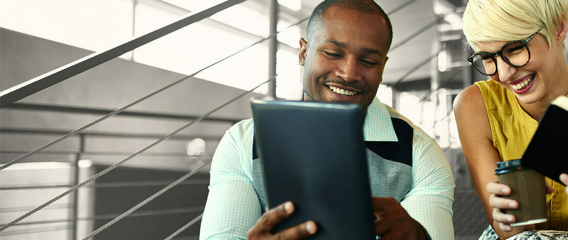 man and woman reviewing document