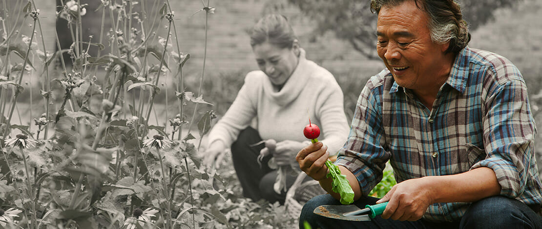 man and woman gardening